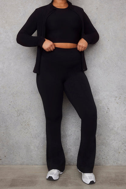 Empower Schlaghose Leggings Curvy - Black