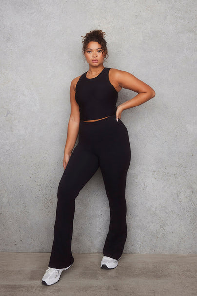 Empower Schlaghose Leggings Curvy - Black