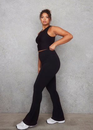 Empower Schlaghose Leggings Curvy - Black