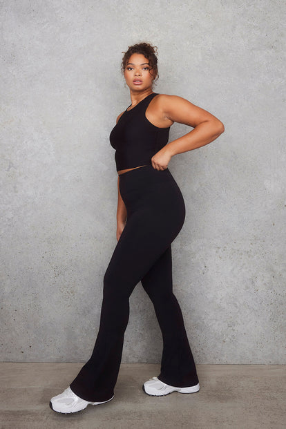 Empower Schlaghose Leggings Curvy - Black